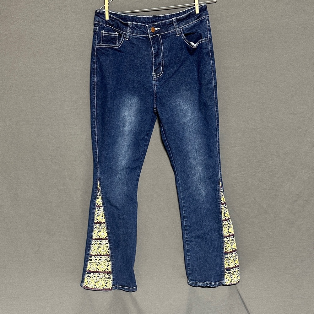 Elegant Blue Flare Jeans with Patterned Insets